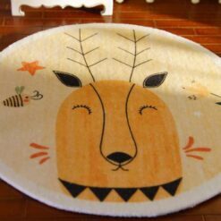 Miniature rug with an abstract deer head and playful motifs like a bee and flower.