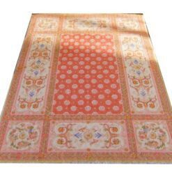 Elegant Aubusson Style Miniature Rug - Soft Peach with Floral Accents 10 Miniature Aubusson rug in soft peach with floral accents and intricate scrollwork.