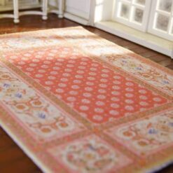 Elegant Aubusson Style Miniature Rug - Soft Peach with Floral Accents 11 Miniature Aubusson rug in soft peach with floral accents and intricate scrollwork.