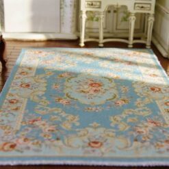 Victorian Miniature Rug - Soft Blue with Floral Medallion Design 10 Miniature Victorian rug in soft blue featuring a central floral medallion surrounded by scrollwork.