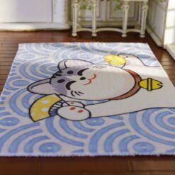 Miniature Japanese-style rug with a smiling cat holding a fan and donut, surrounded by blue waves.