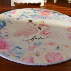 Flamingo Love Floral Miniature Rug – Tropical Elegance 11 A round rug with two flamingos surrounded by pastel flowers and a