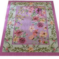 Lavender miniature rug with a pink floral border and purple blossoms with green leaves.