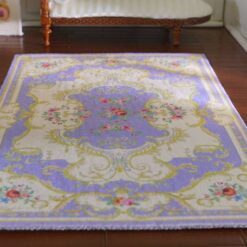 Victorian style miniature rug in purple with floral motifs and ornate borders