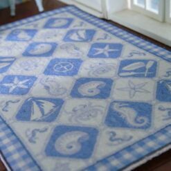 Blue and white nautical themed miniature dollhouse rug with sea motifs Main Colors: Blue, white, cream