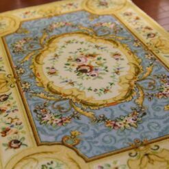 Victorian floral rug with blue center and intricate borders