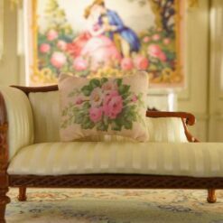 Miniature pillow featuring pink roses and white flowers in green foliage