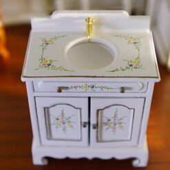 Victorian miniature vanity sink with floral hand-painted design and gold accents