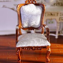 Rococo-style dollhouse miniature armchair with white upholstery and mahogany wood frame