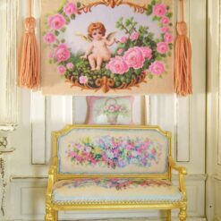 Cherub surrounded by pink roses and ornate golden details, a miniature Aubusson tapestry.