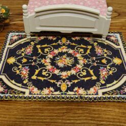 Miniature Louis XIV royal Aubusson rug in black with floral motif.