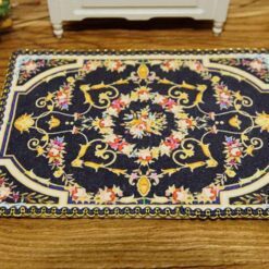 Miniature Louis XIV royal Aubusson rug in black with floral motif.