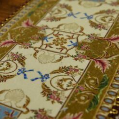 Miniature Aubusson rug with beige, brown, and blue tones and intricate design