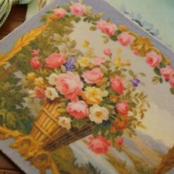 A charming small Aubusson Tapestry of a basket full of roses and daisies The golden border makes it look archaic and the scenery does that rustic charm to this picture worn by them.