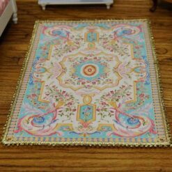 Miniature Louis XV French Aubusson rug in sky blue and cream with floral motifs.