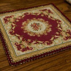 Burgundy red Aubusson miniature rug with intricate floral design, ideal for luxury dollhouses.