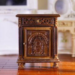 French miniature side table with ornate carvings and aged finish