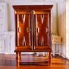 Vintage miniature walnut wardrobe with carved details