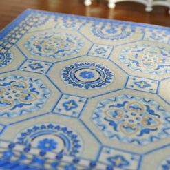 Blue and white Aubusson miniature rug with hexagonal floral patterns