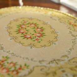 Aubusson miniature rug in oval shape with floral medallion and gold scrollwork