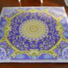 Miniature purple and gold modern French Aubusson rug with geometric design.