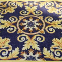 Miniature Aubusson square rug with scroll design in navy and gold.
