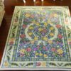 Spiral floral rug with multicolored flowers in Victorian style