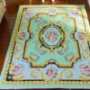 Light green Victorian floral rug with roses and ornate gold detailing