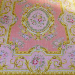 Pastel pink Victorian rug with roses and gold scrollwork