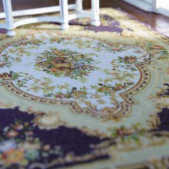 Traditional Aubusson Miniature Rug in Burgandy Floral Motif 11 Classic Aubusson rug with purple and floral design, featuring a central medallion.