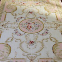 Soft pink Victorian rug with roses and golden swirls