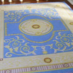Simple French Aubusson miniature rug with soft floral motifs and scrollwork in cream and green
