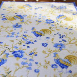 French-style rooster and flower miniature rug in blue and yellow tones