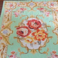 Louis XV Aubusson miniature rug in green with floral scroll design