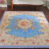 French Aubusson miniature rug with floral design and blue accents
