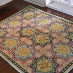 Louis XV Aubusson miniature rug with floral medallion and soft tones