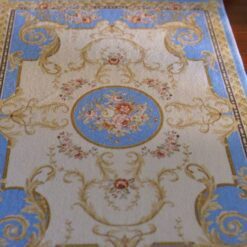 Miniature Victorian rug in blue with floral details