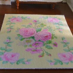Miniature rug with pink roses and soft pastel floral design