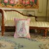 Pink Dress Rabbit Mini Pillow 1 Miniature pillow with a rabbit in a pink dress and blue handbag framed by roses
