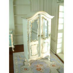 White dollhouse wardrobe with mirrored doors and gold embellishments