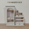 A floral wardrobe and matching side cabinet for dollhouses.