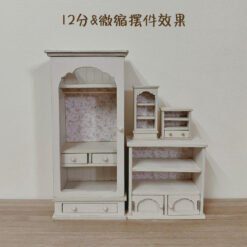 A floral wardrobe and matching side cabinet for dollhouses.
