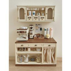 Double-door dollhouse cabinet with metal label accents