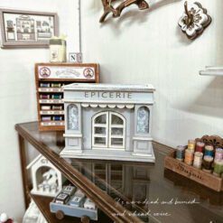 Dollhouse Miniature Grocery Store Display Ki 9 A miniature grocery store display for dollhouses with detailed wallpaper.