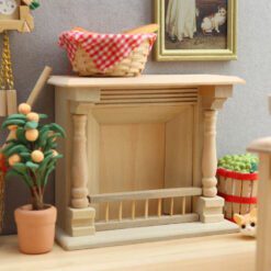 Miniature dollhouse fireplace with detailed wooden columns and natural finish