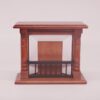 Walnut Colonial-style miniature dollhouse fireplace with decorative pillars