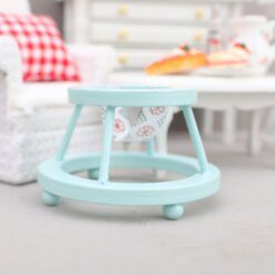 Miniature wooden walker for dollhouse nursery, available in multiple colors.