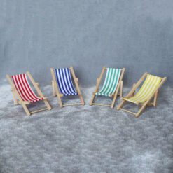 Miniature Striped Beach Chairs Set – Red, Blue, Green, Yellow 8 Set of four miniature beach chairs with striped fabric in red, blue, green, and yellow for dollhouses.