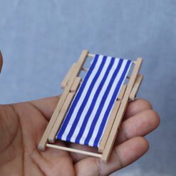Miniature Striped Beach Chairs Set – Red, Blue, Green, Yellow 10 Set of four miniature beach chairs with striped fabric in red, blue, green, and yellow for dollhouses.