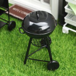 Miniature metal barbecue grill with round top and black finish